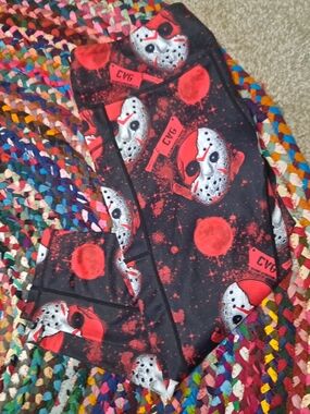 Constantly Varied Gear Black and Red Horror Mask Leggings Tag Detail